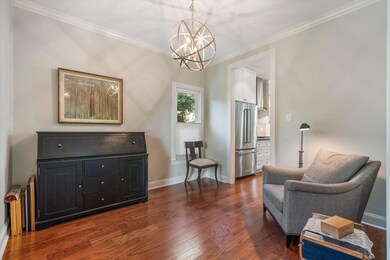 Sitting room featuring dark hardwood / wood-style 