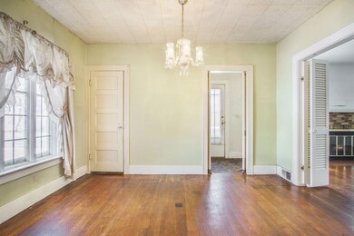 Dining room also has wood floors