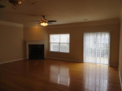 Unfurnished living room featuring a fireplace with