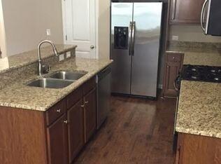 Kitchen has granite counter tops.