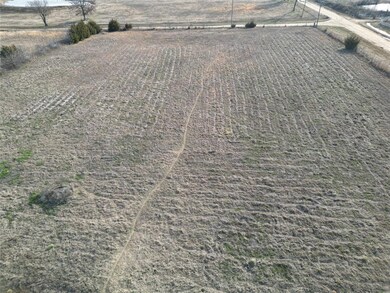 Birds eye view of property featuring a rural view