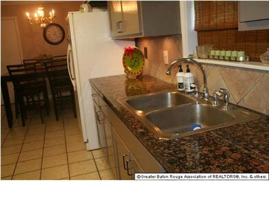 Kitchen Opens to den