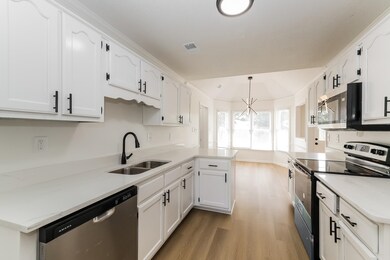 Kitchen featuring appliances with stainless steel 