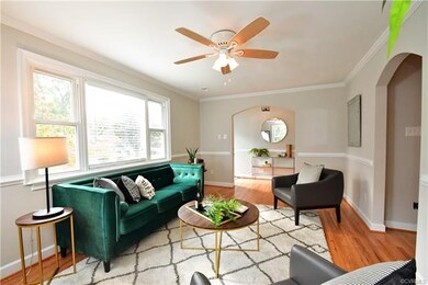 Crown Moulding and Chair Railing in the Living Room and Foyer
