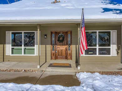 10567 W Chautauga Mountain, Littleton, CO 80127 - photo 2