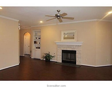 Living Room. Center fireplace with white limestone