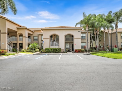 Front View of 19991 Barletta Lane #1926 and Guest Parking