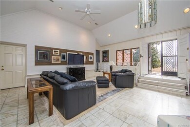 Spacious and beautiful great room with marble tile