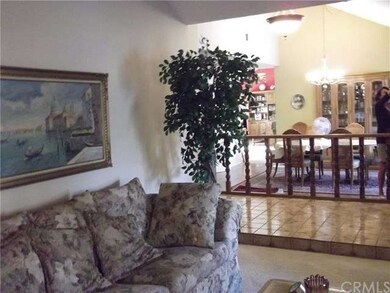View from formal living room to dining area and fa
