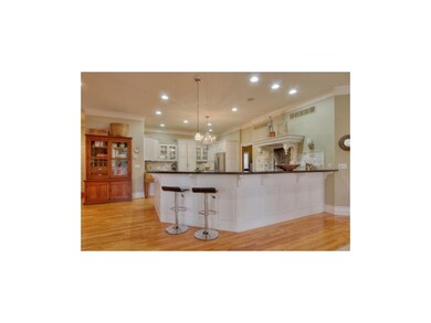 Open Kitchen has Hardwood Floors, Granite Counters