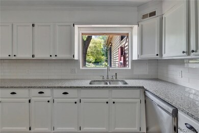 Nice bright kitchen with plenty of counter space.