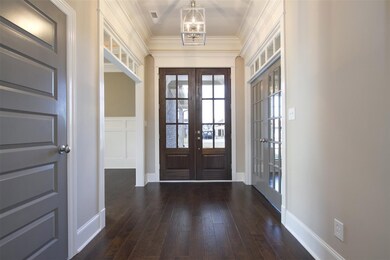 Notice the extensive trim work as you enter into the foyer