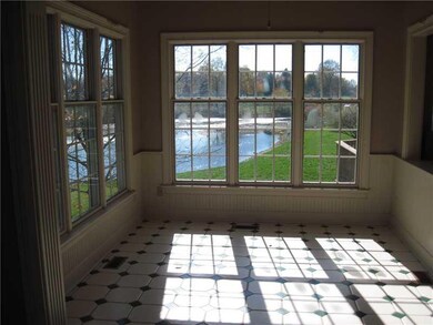 Sun Room. This incredible view is the sun room or perhaps a breakfast room just off the kitchen , this room is very lovely