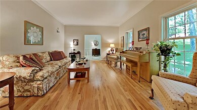 Spacious living room with hardwood flooring