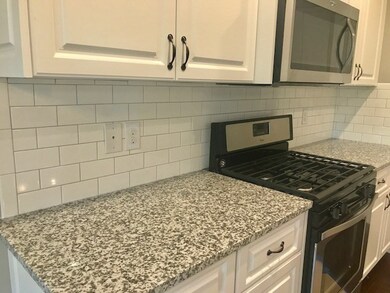 Granite Counters and tile backsplash