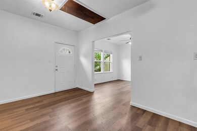 A warm entrance and spacious unit.