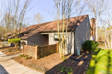 Spacious end unit with new roof and gutters