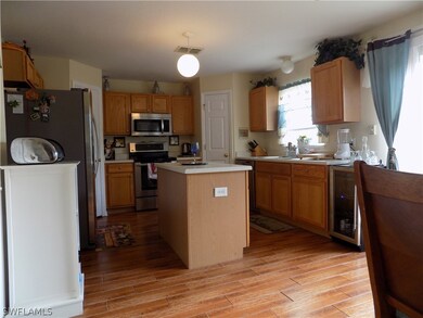 Spacious kitchen with stainless LG applicances.  V