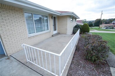 Relax with your morning coffee on the front porch 