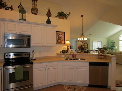 Kitchen. Corian counter tops and stainless steel a