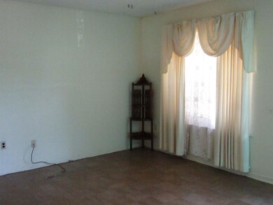 Empty room featuring a healthy amount of sunlight