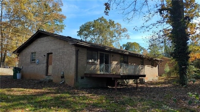 Back of house with brick siding