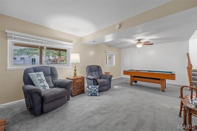 Playroom with pool table, carpet floors, and ceiling fan