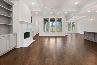 Wonderful open floor plan enhanced by the wood tri