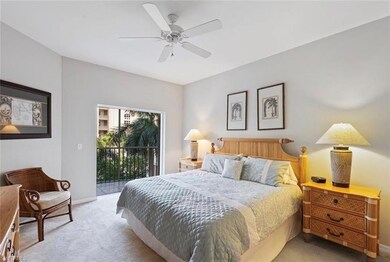 Bedroom featuring ceiling fan, access to exterior,