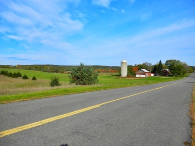Multiple buildings including 20x50 silo