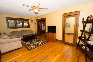 Roomy living space with beautiful hardwood floors,
