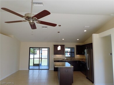 DINING ROOM WITH SLIDING GLASS DOORS OUT TO SCREEN