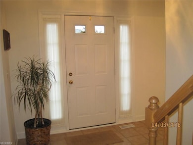 Ceramic tiled Foyer