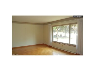 Large living room with hardwood floors.