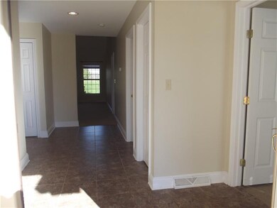 Entrance Hall door to right is to Den