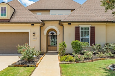 This is a great gated courtyard stucco exterior th