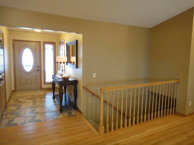 Foyer with Coat Closet and Ceramic Tile with Open 