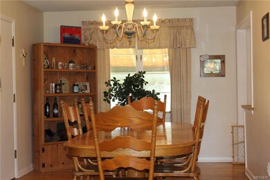 Formal dining area that opens up to the living room.