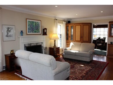 LIVING ROOM SHOWING FRAMED FIREPLACE, CUSTOM-MADE 