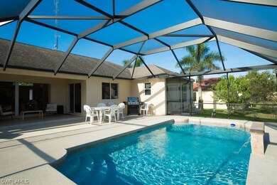 Pool and lanai area with sliders to the breakfast