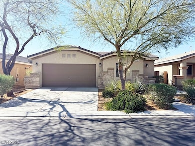 View of front of property with concrete driveway,