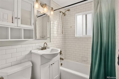 Full bathroom features subway tile