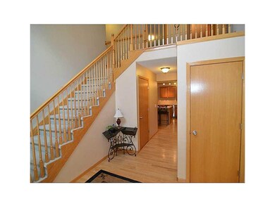 Foyer. Open entrance foyer, coat closet and steps 