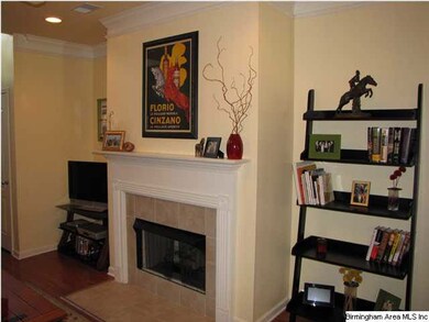 Another view of living room fireplace.