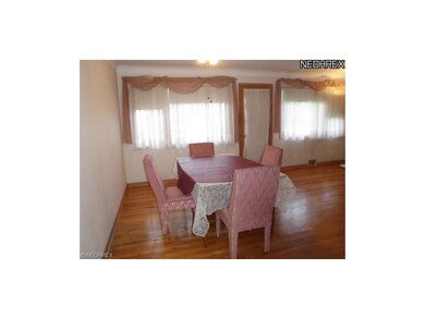 Gleaming hardwood floors thruout living,dining and