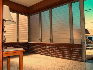 Photo. Front Glass Enclosed Porch