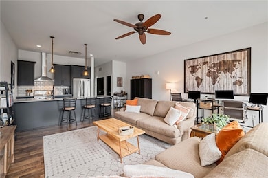 This sun-filled living space features an open layo