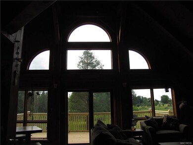 View from family room to front of the house & deck