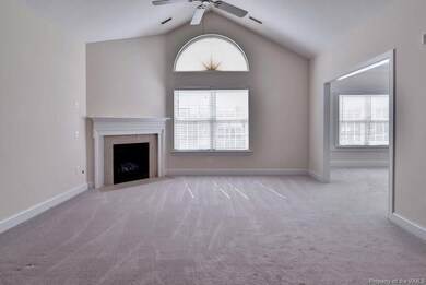 Living Room with Gas Logs, Palladian Window, and V