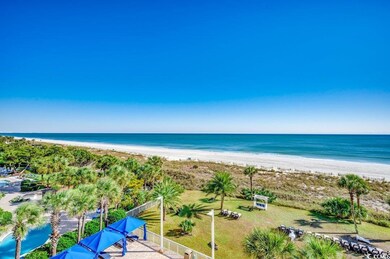 Property view of water featuring a beach view